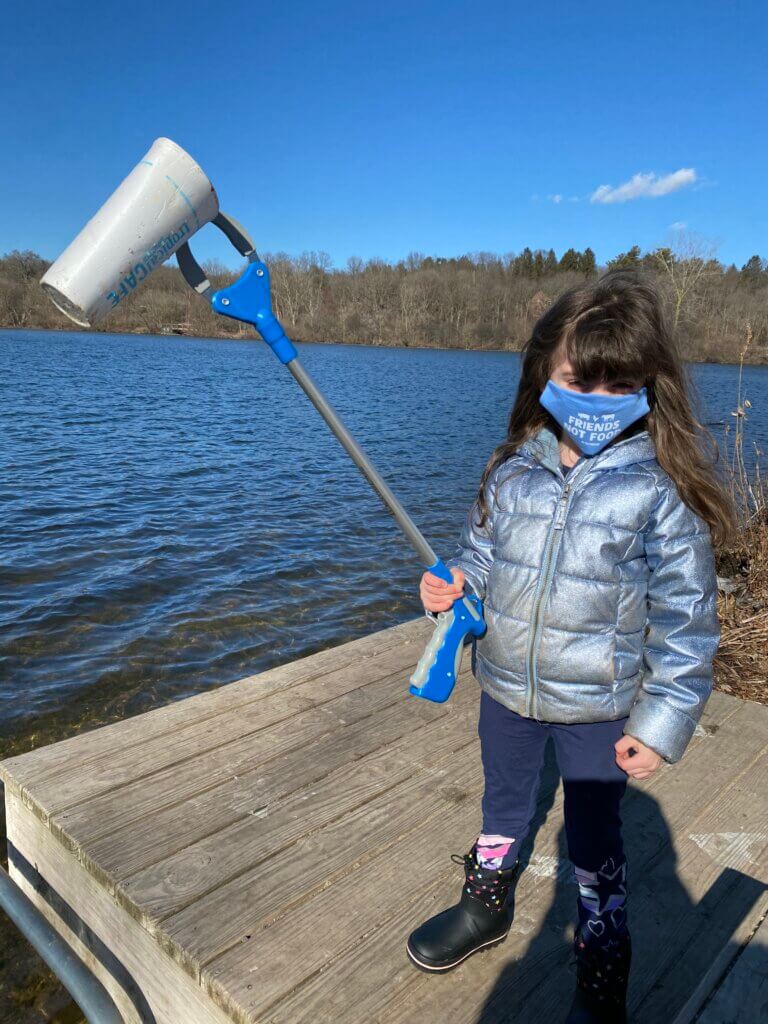 https://headlines.peta.org/wp-content/uploads/2021/03/little-girl-picks-up-litter-in-michigan-768x1024.jpg