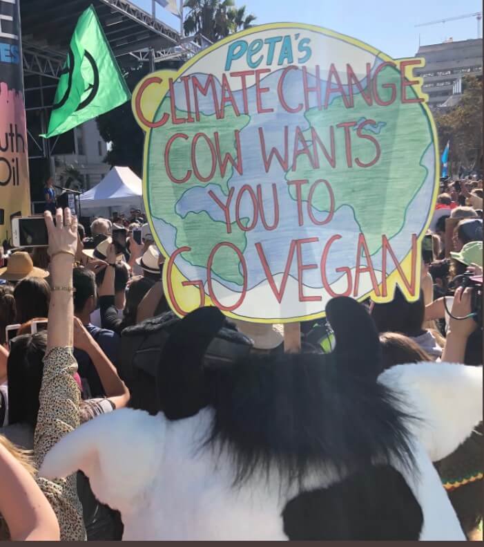 climate change cow go vegan for the earth day peta 2021