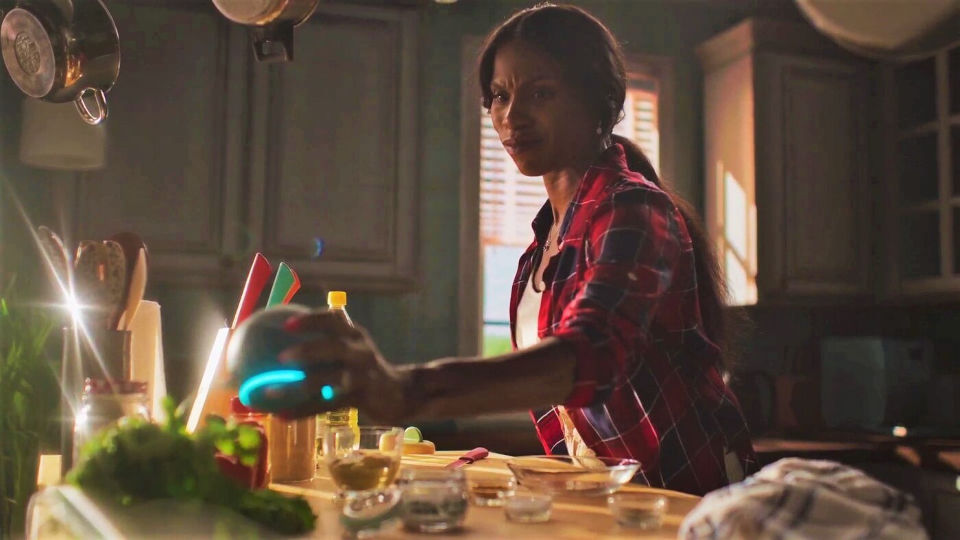 woman holding a smart device Smart Devices Tell the Truth in PETA Commercial