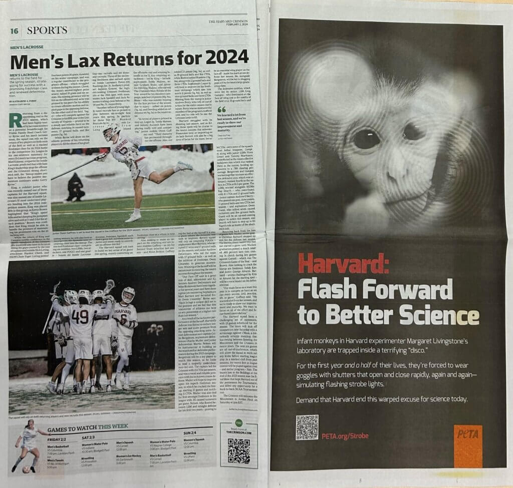 Photo of Harvard paper spread with PETA ad on the right