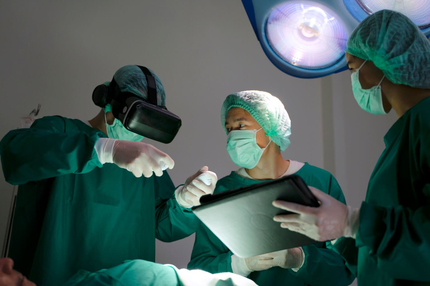 A surgeon wearing a VR set