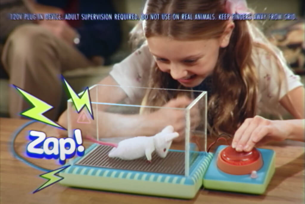a child plays with a lab animal "science" kit for kids