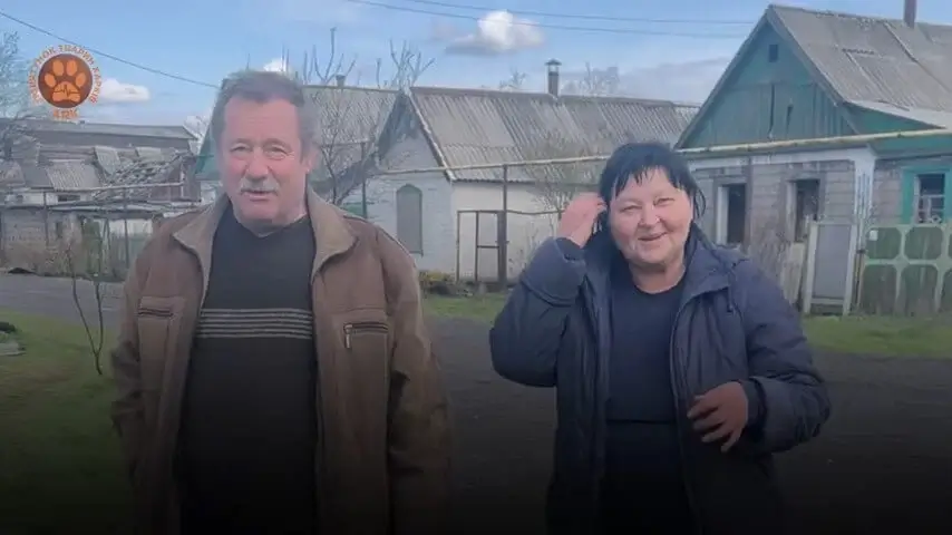Two people looking at the camera