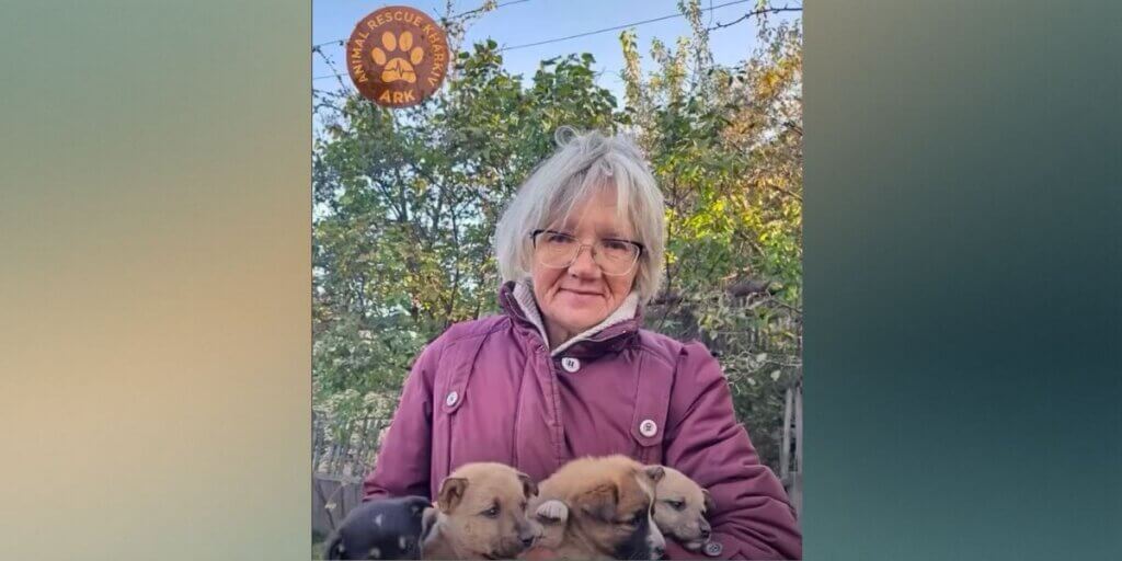 Tetiana with rescue puppies
