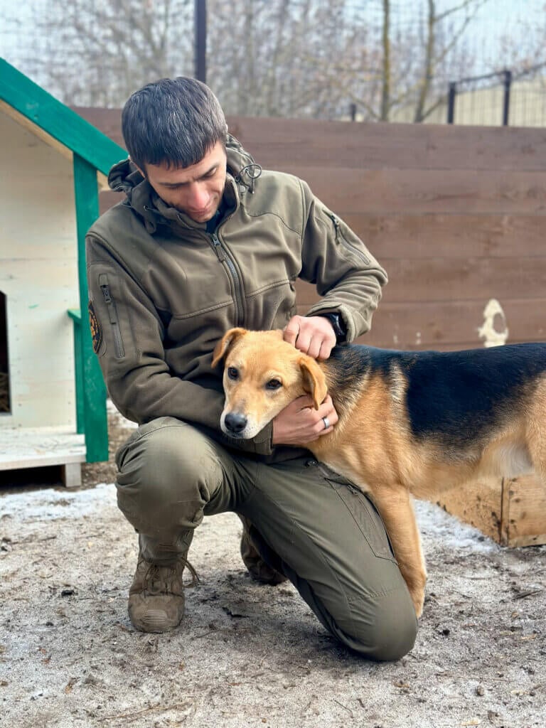 Ruslan with rescued dog
